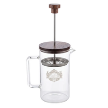 Szklany zaparzacz do herbaty Basilur Tea Press z metalowym filtrem i logo marki