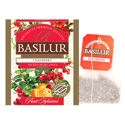 Saszetka herbaty Basilur Cranberry oraz torebka z naparem – owocowa herbata bez kofeiny.